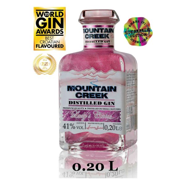 Mountain Creek Lady’s Choice SHIMMER EDITION je premium craft destilirani gin, prekrasne ružičaste boje, te neodoljivog mirisa i okusa. Lady’s Choice gin proizveden je od premium pšeničnog destilata, destiliranog kroz sedam kolona, te mekane izvorske planinske vode. Lady’s Choice u svome sastavu ima 29 različitih biljnih vrsta, a karakteriziraju ga arome crvenog voća, prvenstveno jagode, maline, kupine i borovnice. SHIMMER EDITION je serija ginova obogaćena dodatkom jestivih glitera (šljokica) koja ginovima daje prekrasan vizuelni efekt i čini ih izuzetno atraktivnima. Napomena: jestivi gliteri nisu štetni za organizam, te nemaju nutritivnu vrijednost, već piću daju specifičan i atraktivan izgled.